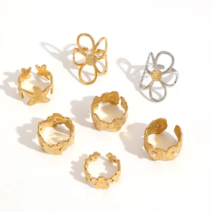 Hollow flower and starfish cutout rings in gold and silver stainless steel set