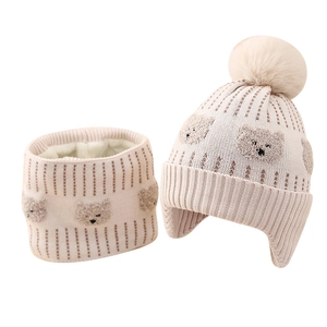 Winter set for boys featuring a bear pattern knit hat with earflaps and fleece neck warmer