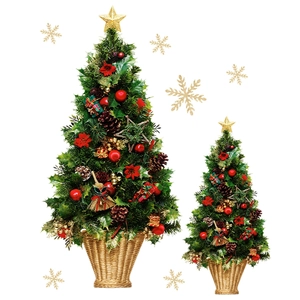 Set of two decorative Christmas trees in red, green, and gold with woven basket bases