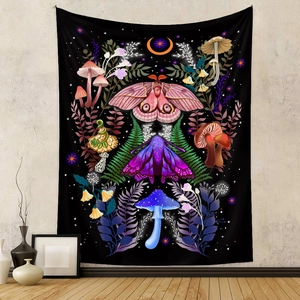 Black bohemian tapestry detail with colorful moths, mushrooms and crescent moon patterns