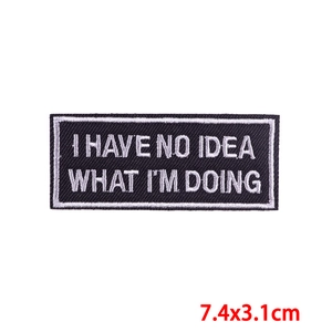 Detailed view of 7.4x3.1cm black embroidered patch with I Have No Idea What I'm Doing text