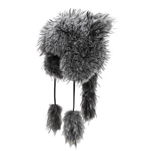 Faux fur raccoon style winter hat with earflaps and plush pom-poms on white background