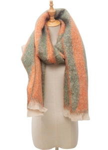 Detail of color-block striped scarf with orange and green chunky knit texture and fringe