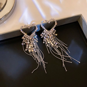 Sparkling silver heart fringe earrings with rhinestones in a luxury jewelry gift box