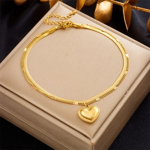 Double-layered gold titanium anklet with heart pendant engraved I Love You on jewelry box