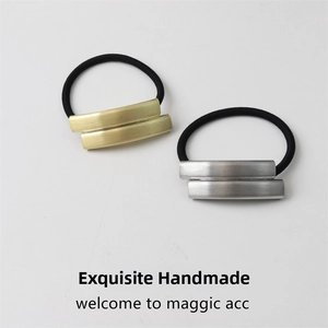 Detail of high-elastic hair ties with rectangular gold and silver brushed metal accents