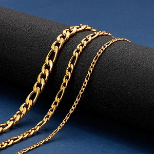 Macro shot of 18K gold-plated stainless steel NK link chains in three various widths