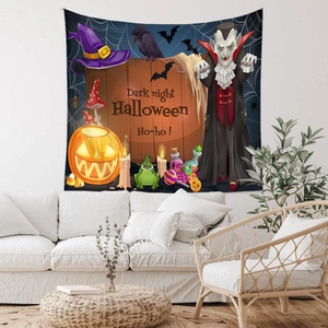 Detail of Halloween tapestry with pumpkins and witches above a white sofa in a living room