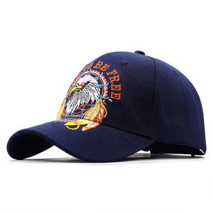 Dark blue baseball cap with embroidered eagle and Born to Be Free text on stiff crown