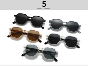 Flat lay of polarized round sunglasses in five optional colors on a white background
