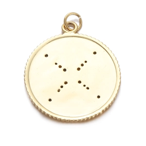 Detail of a gold plated circular pendant featuring a compass star pattern with zircon accents
