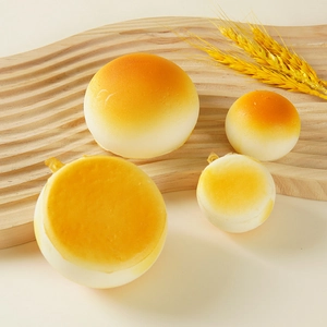 Realistic slow rebound PU roasted bun squishy toy set in large and small sizes on wooden tray
