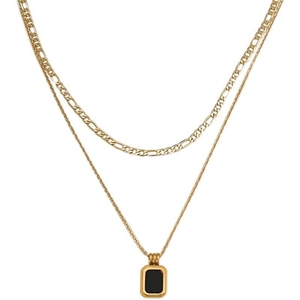 Double-layered gold Figaro chain necklace with a black rectangular pendant on white background