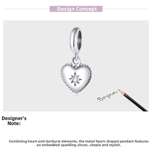 Macro detail of S925 sterling silver starburst heart charm with sparkling cubic zirconia