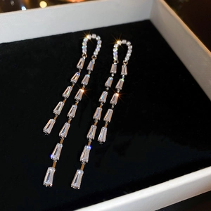 Sparkling U-shaped long tassel earrings with silver needles and clear zircon crystals