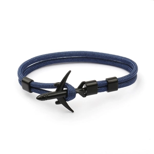 Close-up of blue paracord braided bracelet with a black metal airplane clasp