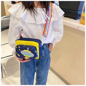Close-up of kids crossbody bag with UFO pattern and colorful rainbow strap