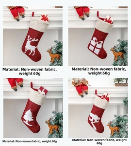 Set of 4 festive red Christmas stockings with white faux fur cuffs and felt holiday patterns