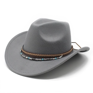 Close-up of gray wool cowboy hat featuring turquoise beads and braided leather band
