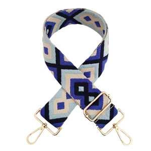 Detail of 5cm diamond jacquard bag strap with adjustable light gold metal hardware clips