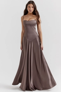 Detailed view of taupe satin maxi dress showing geometric seams and smooth silk texture