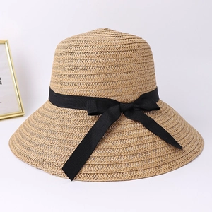 Stylish khaki straw sun hat with large brim and black ribbon bow for women's beachwear