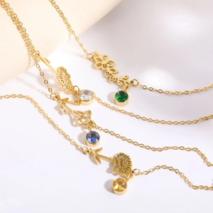 Golden flower pendant bracelets with colored zircons and intricate hollow metal patterns