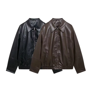 Detail of faux leather bomber jackets with ribbed cuffs, zipper closure, and lapel collars