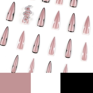 Long stiletto press on nails in nude pink with French lines and silver snake rhinestones