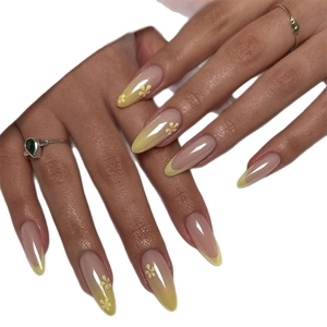French gradient press-on nails with 3D yellow flower design in almond shape