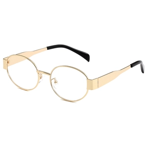Classic oval metal sunglasses with gold frames and black temple tips in a 45-degree view