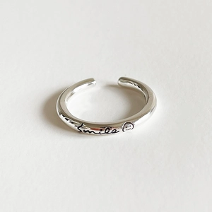 Minimalist S925 sterling silver open ring featuring a smile face and smile text