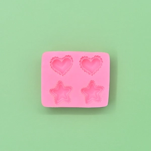 Pink silicone mold with heart and star shapes for DIY soap and candle making