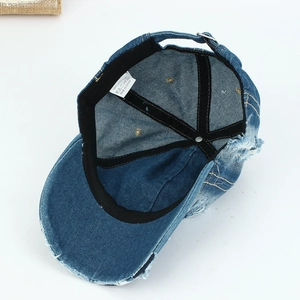 Vintage washed blue denim baseball cap in 100% cotton with distressed ripped brim details