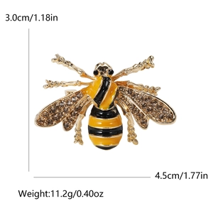 Golden honey bee brooch with yellow enamel stripes and rhinestone wings, size 4.5cm x 3.0cm