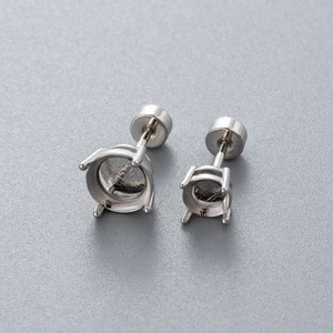 Titanium steel screw-back stud earrings with four-prong settings for round stones