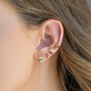 Detailed close-up of 18K gold plated hamburger and fries earrings with zircons