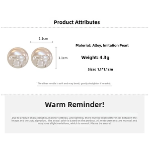 Detail view of pearl bow stud earrings with dimensions 1.1cm and silver pin material