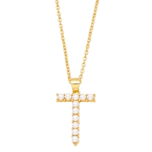 Macro detail of gold-plated necklace with a pearl-inlaid letter T pendant