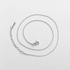 Polished silver stainless steel snake chain necklace with lobster clasp and extender