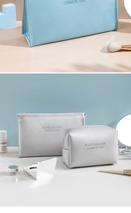 Three-piece metallic PU leather cosmetic bag set in light blue and silver-gray colors