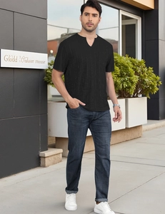 Close-up of black men's short-sleeved V-neck shirt showing subtle vertical striped texture