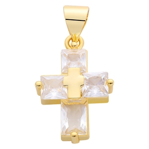 Macro detail of gold cross pendant featuring large clear cubic zirconia and a center cross