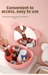 Pink bear-shaped vanity box with a mirror lid and multi-layer makeup storage compartments