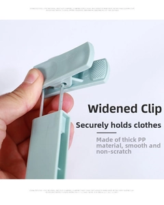 Close-up of wide-mouth non-slip pants hanger clip in light blue durable PP material