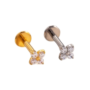 Titanium flower labret stud with crystal zirconias in silver and gold finishes