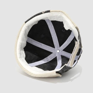 Detail view of cotton miki hat interior showing sweatband and reinforced 6-panel stitching