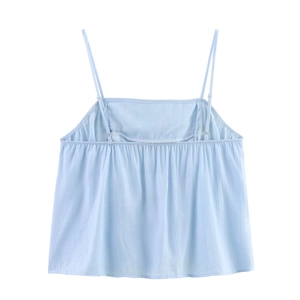 Detail of light blue camisole top showing vertical stripes and elastic shirred back