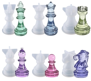 Detail view of chess piece silicone molds with colorful transparent resin samples