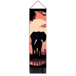 Detailed view of forest elephant silhouette wall tapestry with warm sunset colors and tassels